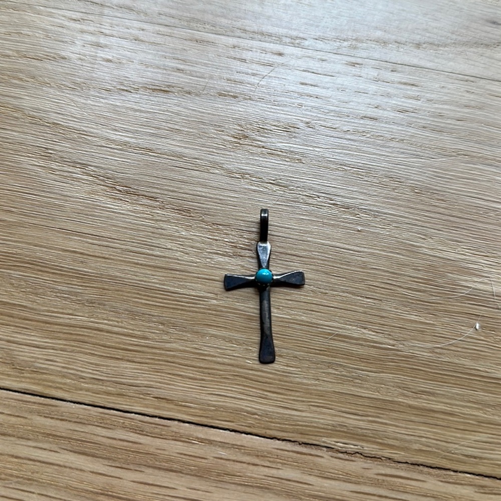 Sterling silver cross pendant with turquoise accent